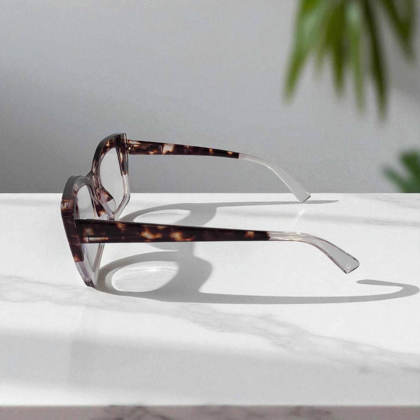Crystal Clear Tortoiseshell Reading Glasses crystal clear tortoiseshell reading glasses with blue light filter on white surface