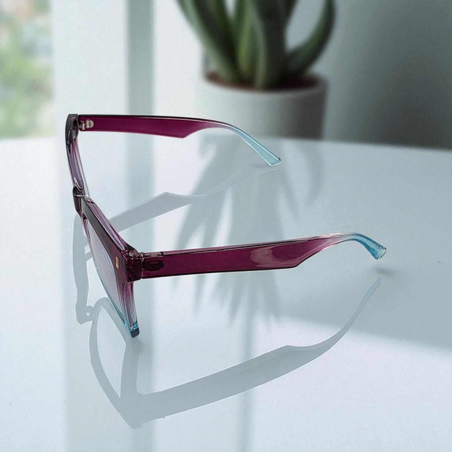 Purple and blue square reading glasses with blue light filter for eye protection and style