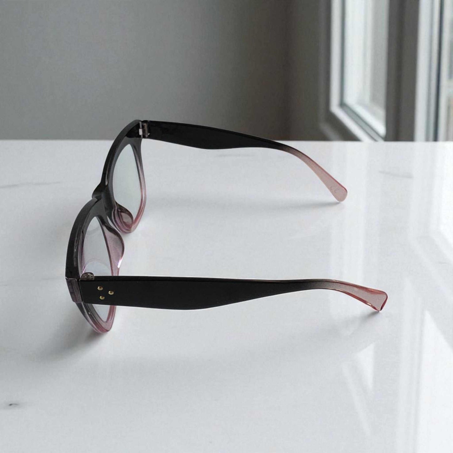 Black and crystal pink cat eye reading glasses with blue light filter and thick two-tone frames