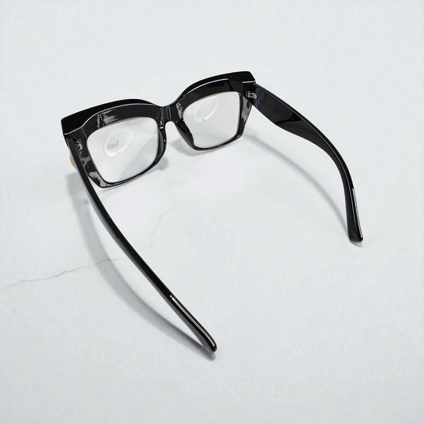 Black oversized cat eye reading glasses with blue light filter and glossy black frame