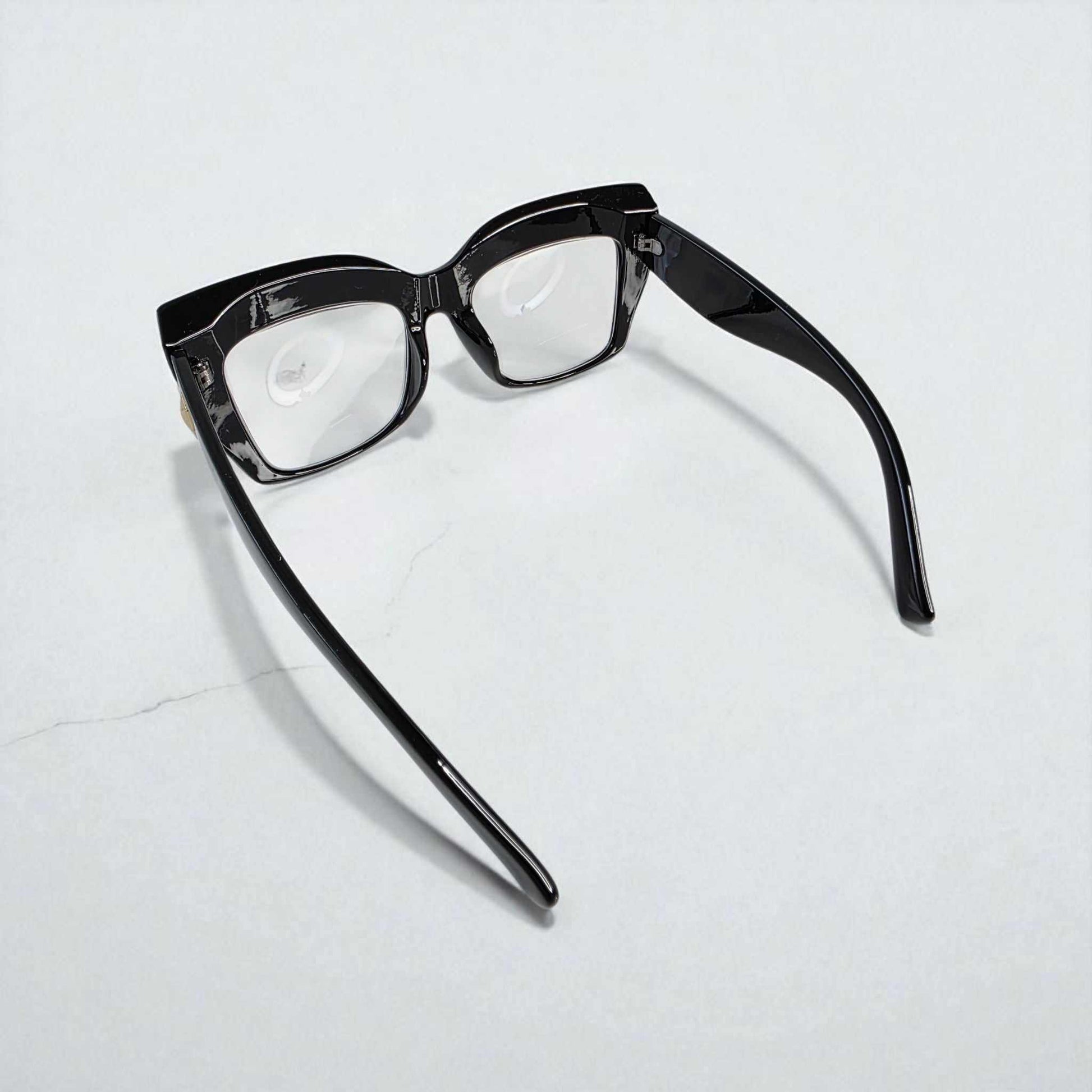 Black oversized cat eye reading glasses with blue light filter and glossy black frame