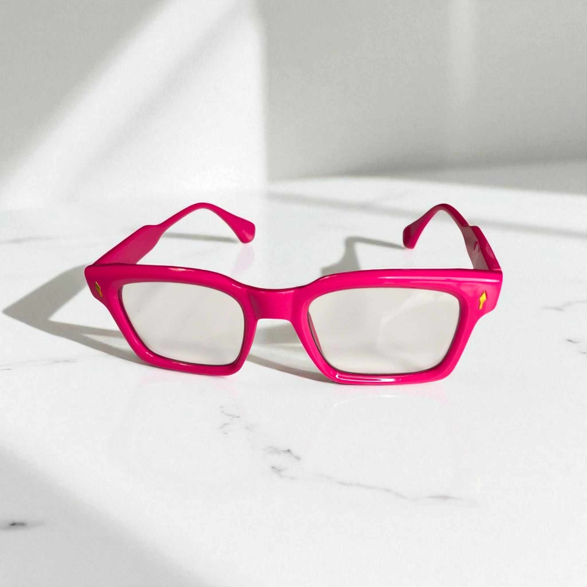 Tickled Pink reading glasses with blue light filter and stylish vibrant pink frames for eye protection and reduced strain.